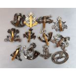 12 assorted military cap badges queens own yeomanry,scots royal grays ,royal Guernsey etc