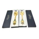 Pair of boxed silver & enamel A.Michelsen year spoons