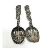 Pair of antique asian silver dragon handle spoons each measure approx 14cm long xrt tested as 800