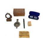 Box of miscellaneous includes pocket watch on stand, fountain pen etc