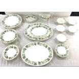 Part Wedgwood dinner service to include plates, meat plates, gravy boat etc