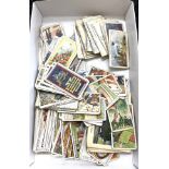 Selection of vintage cigarette cards includes Wills, Players etc