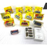 Selection of boxed cars includes sports car collection, jaguar, all boxed