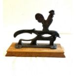 Vintage nut cracker on wooden base