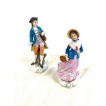 Two Antique Dresden porcelain figures, over all good condition, height approximately 8" tall