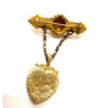 15ct gold bar brooch with a 9ct gold heart locket total weight 7grams