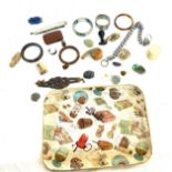 Tray of collectable items includes bangles, razor blade etc