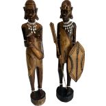 Pair of Masai wood carvings male and female measures approx 24 inches tall