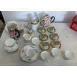 Selection of assorted pottery includes universal ware white and gold coffee set, tea pot, oval plate