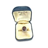 Ladies 18ct diamond and garnet set dress ring, ring size K