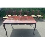 Mahogany 3 leaf table and 10 chairs including 2 carvers