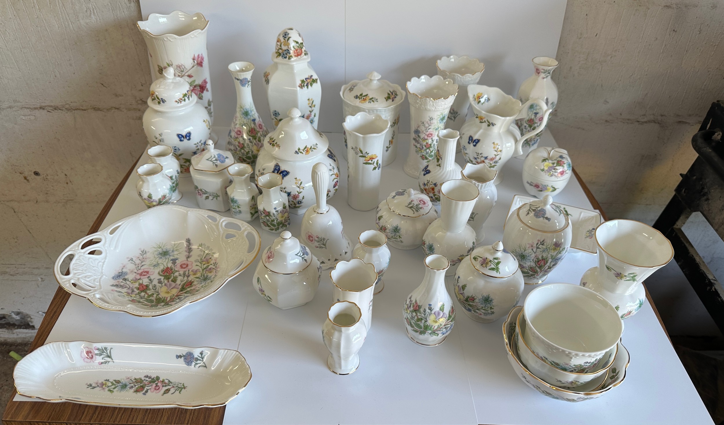 Large selection of Aynsley pieces to include jugs, vases and the patterns Cottage gardens and Wild