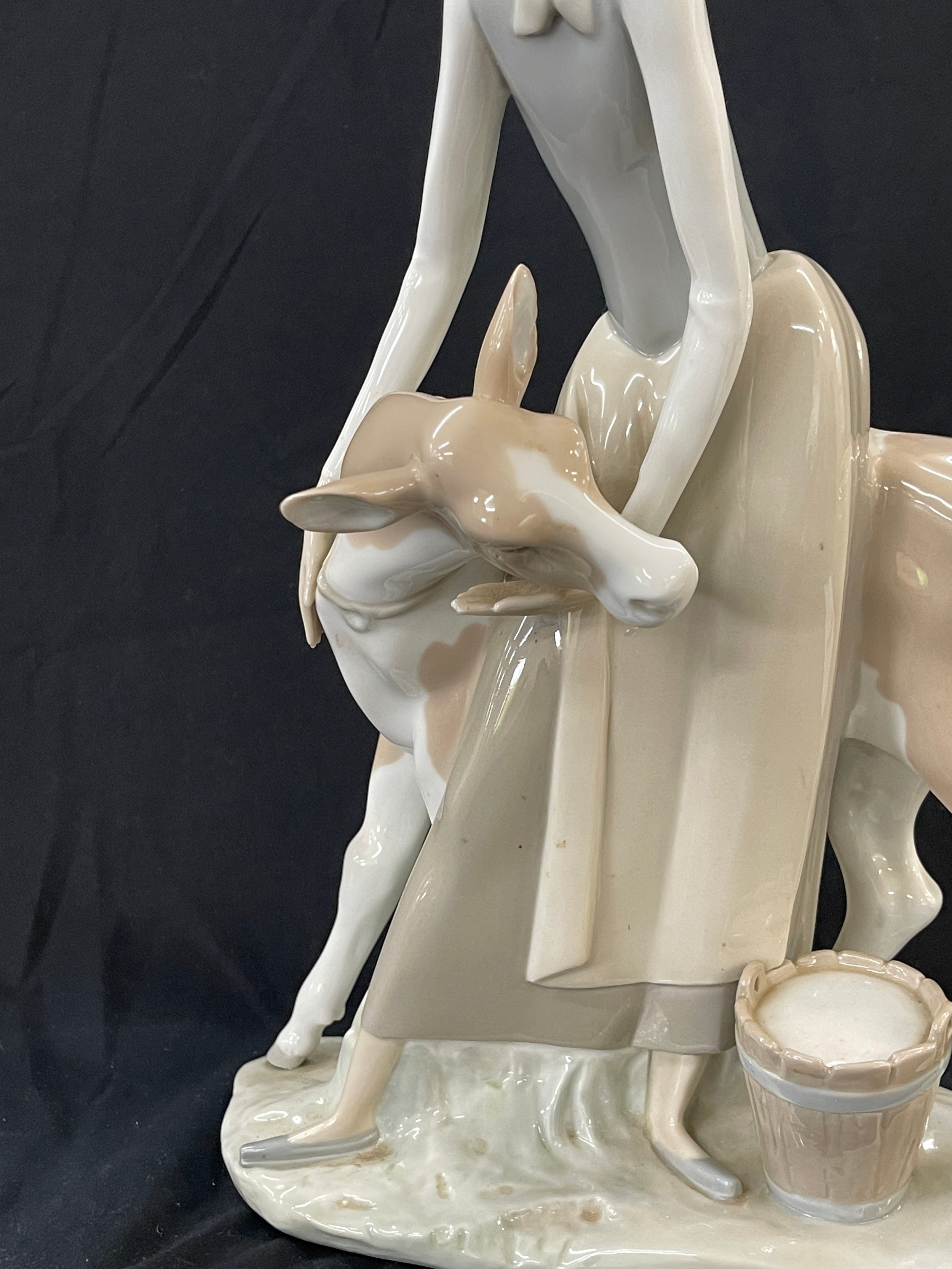 Lladro Porcelain Farmer Girl Miling Cow measures approximately 13 inches tall - Image 5 of 9