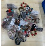 Selection of assorted costume jewellery includes bangles etc