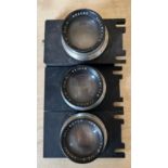 Three vintage Dallmeyer pentac lenes to include f.4 f/2 482067, f/2 9 482059 and f/2.9 482038