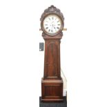 Mahogany long cased clock with pendulum and key measures approx 80 inches tall by 18.5 inches wide