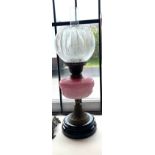 Vintage glass oil lamp, complete with shade and funnel Height approximately 23 inches