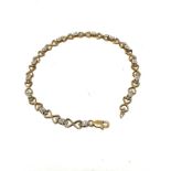 9ct gold diamond heart link tennis bracelet (4g)