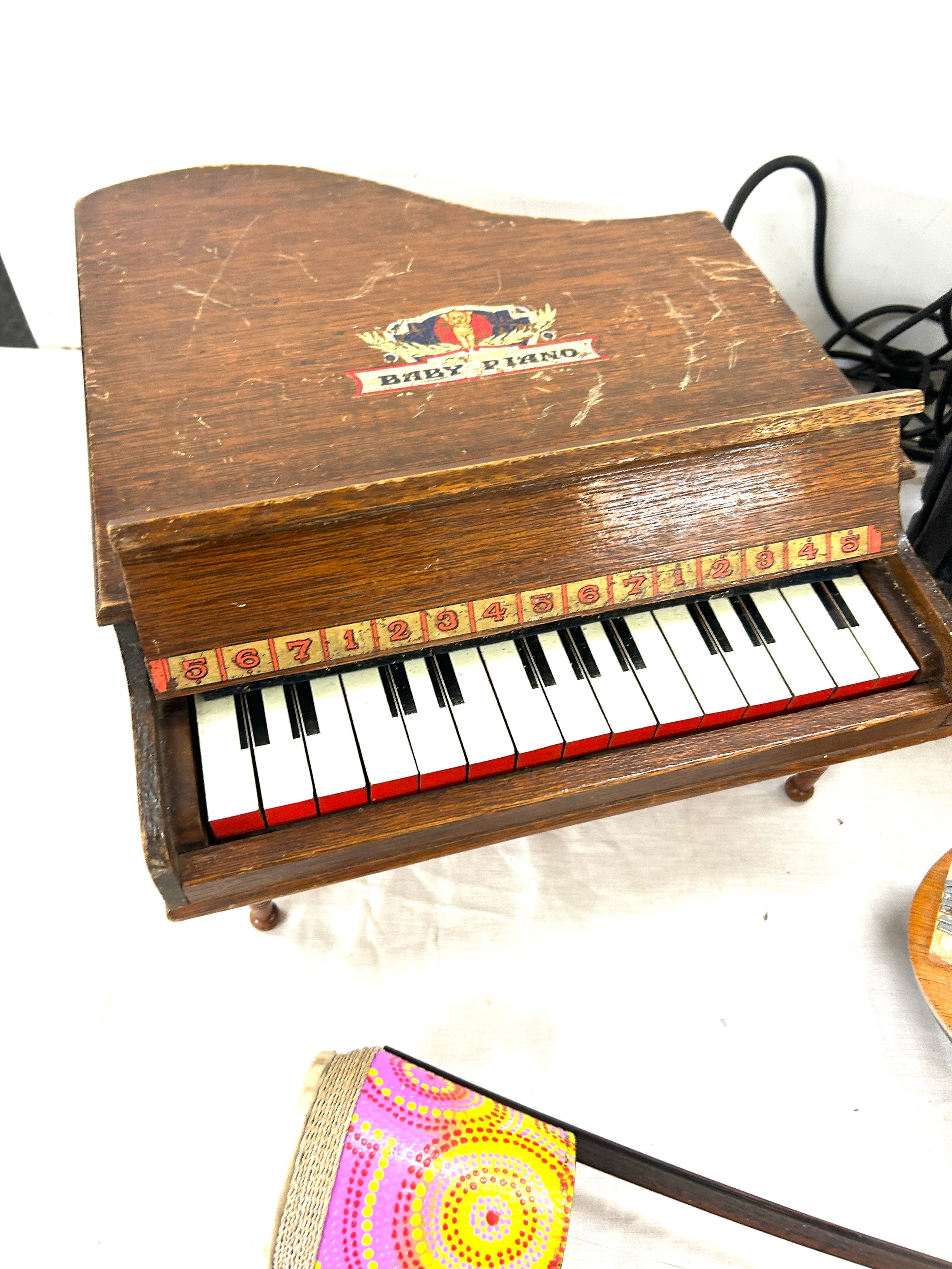 Selection of musical instruments includes baby piano, wooden hand painted instruments, amp etc - Image 3 of 3