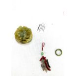 Selection of jade items includes carved figure, jade ring and a pendant