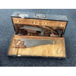 Wooden tool chest will a large selection of wood workers tools