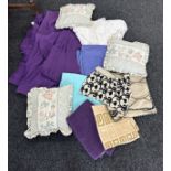 Large box of linen including new curtains, table cloths, cushion lace curtains etc