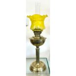 Art Deco brass oil lamp with yellow shade and funnel, overall height 26 inches, approximate