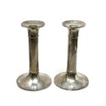 Pair of silver candlesticks measure approx height 15.5cm