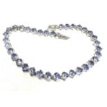 9ct white gold tanzanite tennis bracelet (12.7g)