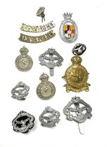 collection of police badges inc kenya -northern rhodesia sarawak etc