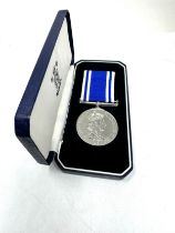 Boxed ER.11 Police long service medal to constable audrey j.simpson