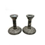 Pair of antique silver candlesticks measure height 10cm