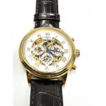 Rotary calendar gents gold tone skeleton movement automatic wristwatch