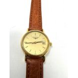 Longines ladies gold tone quartz wristwatch ref l4.136.2 the watch is ticking