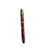 Vintage Conway Stewart 85l with 14ct gold nib, red marble