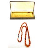 Amber necklace with a silver clasp approx length 26 inches long