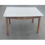 1960's dining table with drawer measures approx 76 cm tall by 122 cm wide and 81 cm deep