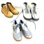 Selection of assorted boots includes Timberland, Nike size 8.5 and football boots size 4