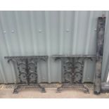 Wrought iron table ends with support bar