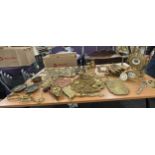 Large selection of brass and copper ware includes clocks, picture frames etc