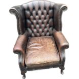 Leather Chesterfield fireside chair, approximate measurements: Height 103cm, Width 83cm, Depth 74cm