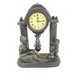 Resin lady mantel clock with pendulum, battery operated, approximate height 12 inches