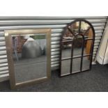 Two framed mirrors largest measures approximately 41 inches tall 25 inches wide
