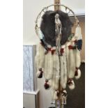 Large Native American dream catcher, made with animal fur, measures approximately 32 inches by 14