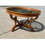 Mahogany glass topped coffee table 19 inches tall 33 inches diameter