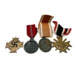 4 ww2 german medals inc western front merit cross with swords