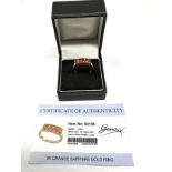 Certificated 9ct gold Orange sapphire ring C.O.A