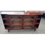Mahogany 3 shelf 2 door bookcase measures approximately 33.5 inches tall 60 inches wide 12 inches