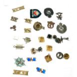 Selection of military cap badges