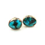 Antique turquoise stud earrings unmarked but probably gold weighs approx 2.7 grams